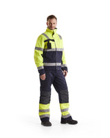 Blaklader Multinorm Winter Trousers 1869 #colour_navy-blue-hi-vis-yellow