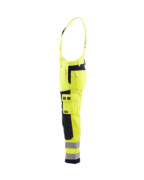 Blaklader Multinorm Bib Trousers 2608 #colour_hi-vis-yellow-navy-blue